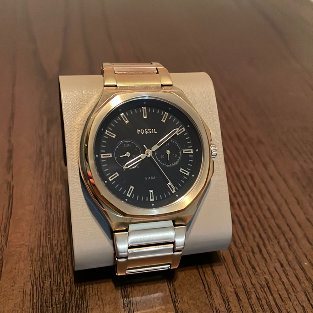 Gold fossil watch